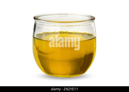 Extra virgin olive oil in glass cup, isolated on white with clipping path included Stock Photo