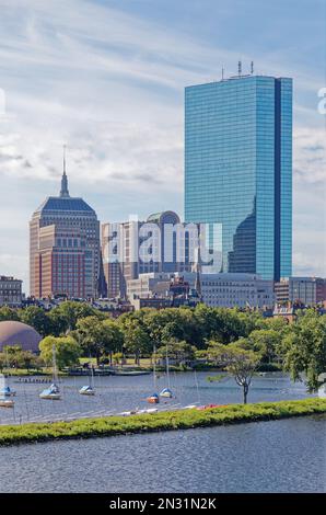 Boston Back Bay: 200 Clarendon Street, is the iconic former John Hancock Tower, a blue-tinted glass monolith that reflects the sky and all around it. Stock Photo