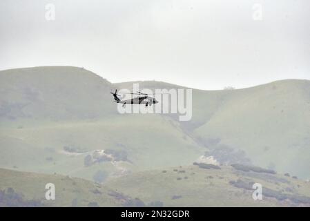 Six UH-60 Black Hawks Army Reserve Soldiers fired thousands of rounds of M240 ammunition during training, Fort Hunter Liggett, California. Stock Photo