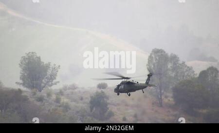 Six UH-60 Black Hawks Army Reserve Soldiers fired thousands of rounds of M240 ammunition during training, Fort Hunter Liggett, California. Stock Photo