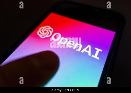 OpenAI ChatGPT logo shown on mobile phone Stock Photo