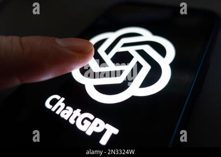OpenAI ChatGPT logo shown on mobile phone Stock Photo