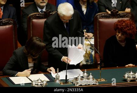 Newly elected Italian President Sergio Mattarella, center, flanked by Lower Chamber President Laura Boldrini, left, and vice-president of Italian Senate Valeria Fedeli, right, delivers his speech during his swearing-in ceremony at the Lower Chamber in Rome, Tuesday, Feb. 3, 2015. Sergio Mattarella on Monday resigned from his post as constitutional judge, a day before his swearing-in ceremony. Mattarella, 73, was elected as the new president on Saturday, in the fourth round of balloting held by Italian parliament in joint session. (AP Photo/Gregorio Borgia)