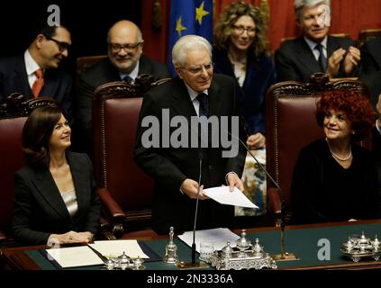 Newly elected Italian President Sergio Mattarella, center, flanked by Lower Chamber President Laura Boldrini, left, and vice-president of Italian Senate Valeria Fedeli, right, delivers his speech during his swearing-in ceremony at the Lower Chamber in Rome, Tuesday, Feb. 3, 2015. Sergio Mattarella on Monday resigned from his post as constitutional judge, a day before his swearing-in ceremony. Mattarella, 73, was elected as the new president on Saturday, in the fourth round of balloting held by Italian parliament in joint session. (AP Photo/Gregorio Borgia)