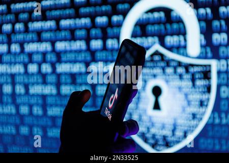 Vilnius, Lithuania - 2023 February 6: TikTok logo on mobile phone screen. TikTok security and data leak Stock Photo