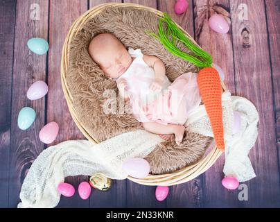 Sleeping, newborn baby. Easter bunny baby costume. Premature baby Stock Photo