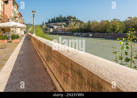 View of Castel San Pietro from the promenade along the Adige river - Verona, Veneto Region in northern Italy Stock Photo