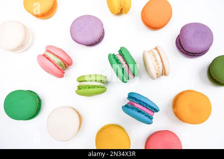 Colorful macaron or macaroons on white background, Top view. Flat lay Stock Photo
