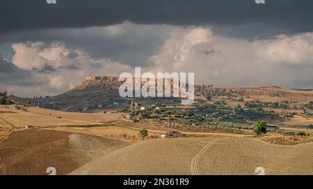 Agricultural area in the inland of south-western Sicily in a cloudy and sunny afternoon; Agrigento province, Italy Stock Photo