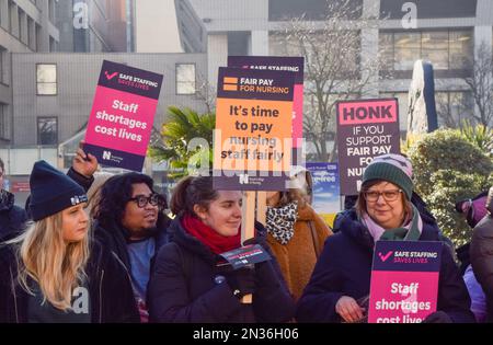London, UK. 07th Feb, 2023. Nurses hold placards in support of fair pay during the demonstration at the picket outside St Thomas' Hospital, as thousands of NHS nurses continue their strikes over pay. Credit: SOPA Images Limited/Alamy Live News Stock Photo