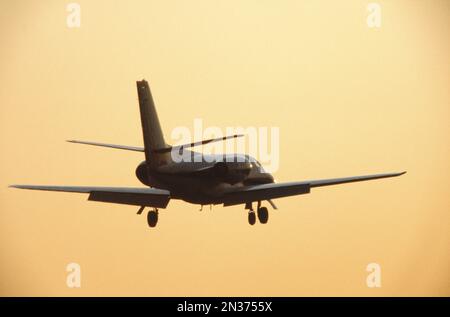 Jet Landing at Sunset, Ottawa, Ontario, Canada Stock Photo