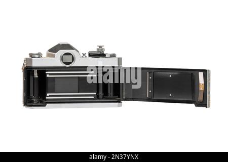 Instructive view showing film chamber, shutter with guide rails, film take up spool and pressure plate on camera back. Stock Photo