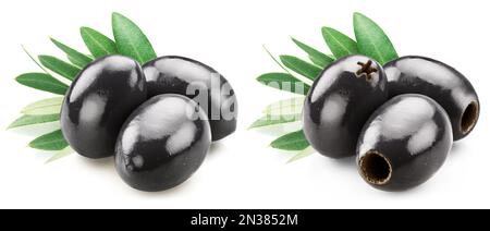 Black pitted olives and whole black olives with leaves isolated on white background. Stock Photo