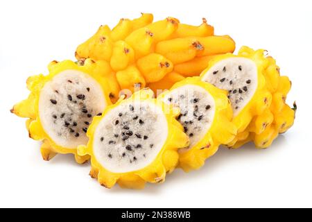 Yellow dragon fruit and dragon fruit slices isolated on white background. Stock Photo