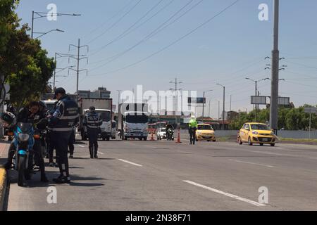 BOGOTA, COLOMBIA - FEBRUARY 02 OF 2023 Police agents and traffic agents on checkpoint near to Transmilenio 'portal del norte' station during bogota no Stock Photo