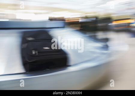 Luggage on Baggage Carousel, Ottawa International Airport, Ottawa, Ontario, Canada Stock Photo