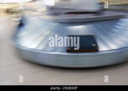 Luggage on Baggage Carousel, Ottawa International Airport, Ottawa, Ontario, Canada Stock Photo