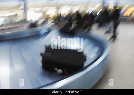 Luggage on Baggage Carousel, Ottawa International Airport, Ottawa, Ontario, Canada Stock Photo