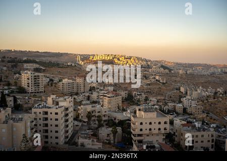 Bethlehem, West Bank, Palestine - 21 July 2022: Old Bethlehem Cityscape in the Foreground and Newer Colonies in the Background with White Stone Classi Stock Photo