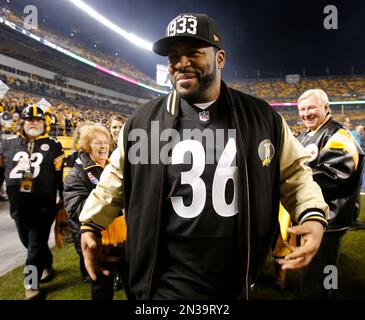 Steelers running back Jerome Bettis holds the Vince Lombardi Trophy up as  the Super Bowl XL champion Pittsburgh Steelers celebrate in a parade down  Fifth avenue in Pittsburgh, Pa., on February 7