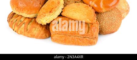 Various of bread and bakery products isolated on white background. Wide photo. Stock Photo