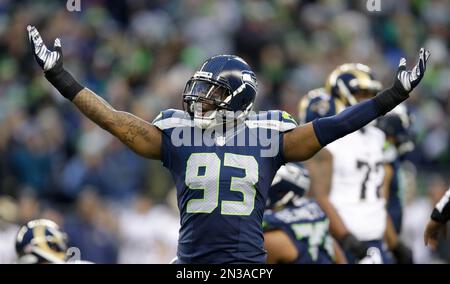 Seattle Seahawks defensive end O'Brien Schofield (93) and Oakland Raiders  tackle Donald Penn (72) has words with one another during the fourth  quarter at CenturyLink Field in Seattle, Washington on November 2