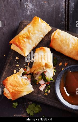 Shrimp spring rolls with dipping sauce Stock Photo