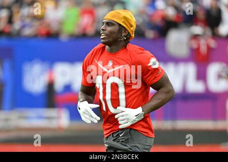 AFC wide receiver Tyreek Hill of the Miami Dolphins warms up before the  flag football event at the NFL Pro Bowl, Sunday, Feb. 5, 2023, in Las  Vegas. (AP Photo/David Becker Stock