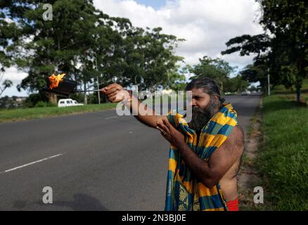 Durban, South Africa. 04th Feb, 2023. A Hindu Guru Kanthan from Havenside Grammmadave Alayam, pray for accidents on M1 Higginson Highway during the annual Thaipoosam Kavady festival at Chatsworth, south of Durban, South Africa on February 4, 2023. Several fatal accidents are reported every year on this highway. (Photo by Mabhuti Msweli/Sipa USA) Credit: Sipa USA/Alamy Live News Stock Photo