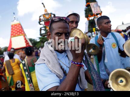 Durban, South Africa. 04th Feb, 2023. A Hindu devotee from Siva Sathi Alayam temple, is hooked with spikes during the annual Hindu Thaipoosam Kavady festival at Chatsworth Teachers Centre, south of Durban, KwaZulu Natal, South Africa on February 4, 2023. During the festival devotees dance and offer prayers to their god, Muruga as they receive purification. (Photo by Mabhuti Msweli/Sipa USA) Credit: Sipa USA/Alamy Live News Stock Photo