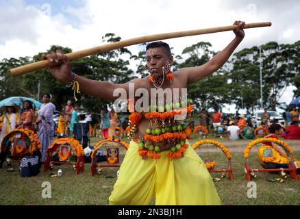 Durban, South Africa. 04th Feb, 2023. A Hindu devotee from Havenside Grammadave Alayam temple, dances during the annual Thaipoosam Kavady festival at Chatsworth, south of Durban, South Africa on February 4, 2023. During the festival devotees dance and offer prayers to their god, Muruga as they receive purification. (Photo by Mabhuti Msweli/Sipa USA) Credit: Sipa USA/Alamy Live News Stock Photo