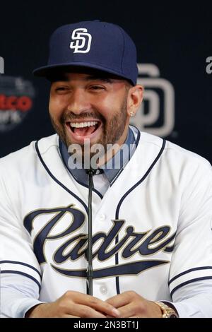 San Diego Padres outfielder Matt Kemp laughs during a news conference  introducing him as part of the baseball club Friday, Dec. 19, 2014, in San  Diego. The Padres deal for the former the Los Angeles Dodger was the first  of three big deals by new Padres
