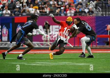 AFC wide receiver Tyreek Hill (10) of the Miami Dolphins carries the