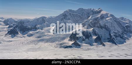 Aerial photo of Kluane National Park, with snow covered mountains making up the landscape. Mount Vancouver is seen here Stock Photo