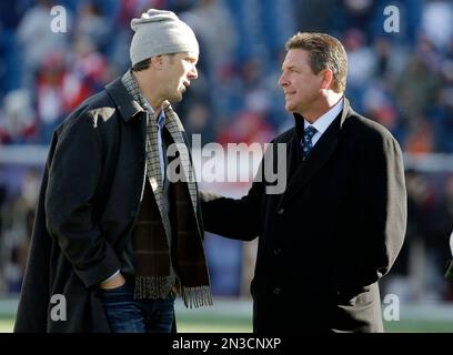 Former New England Patriots quarterback Drew Bledsoe wears the jersey of  Boston Celtics guard Terry Rozier as he stands with Celtics owner Wyc  Grousbeck during the second half of Game 5 of