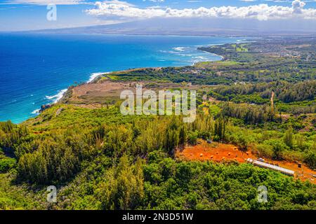 Aerial view of the lush hillside surrounding the rugged coastline of Waihee Ridge in the West Maui Mountains; Maui, Hawaii, United States of America Stock Photo