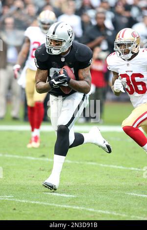 Oakland Raiders WR Mychal Rivera #81 in action, during pre game against the  Arizona Cardinals at the O.co Coliseum during an NFL game in Oakland,  Calif. on Sunday, Oct. 29, 2014. (AP