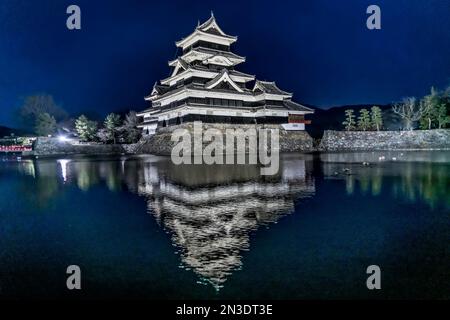 Matsumoto Castle, originally known as Fukashi Castle, is one of Japan's premier historic castles.  The building is also known as the 'Crow Castle' ... Stock Photo