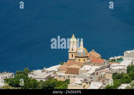 The tiled dome of Parrocchia Di San Gennaro in the town of Praiano on the Amalfi coast; Praiano, Salerno, Italy Stock Photo