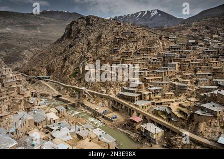 View of a river flowing through a mountain village in the Zagros Mountains; Kermanshah, Iran Stock Photo