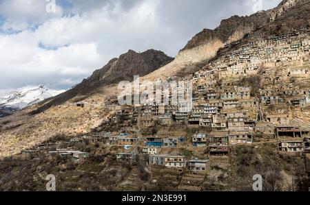 Historical village of Uraman Takht on a steep slope in the Zagros Mountains; Uraman Takht, Kermanshah, Iran Stock Photo