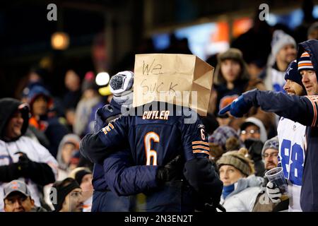 A fan wears a bag on their head during the Detroit Lions-New Orleans Saints  NFL football game in Detroit, Sunday, Dec. 21, 2008. New Orleans won 42-7  to drop Detroit to 0-15.