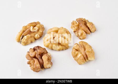 Ripe walnut without shell on white background Stock Photo
