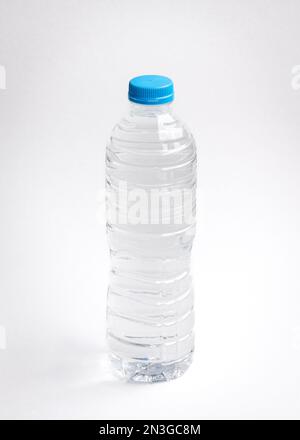 Plastic bottle of drinking water, on white background. Stock Photo
