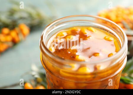 Delicious sea buckthorn jam in jar, closeup Stock Photo