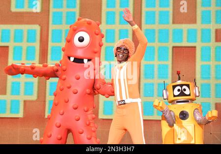 DJ Lance Rock, left, and Plex perform onstage at Yo Gabba Gabba! Live!: Get  The Sillies Out! 50+ city tour kick-off performance on Thanksgiving weekend  at Nokia Theatre L.A. Live on Friday