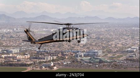 Glendale, United States. 06th Feb, 2023. A U.S Customs and Border Protection Air and Marine Operations UH-60 Black Hawk helicopter conducts a flyover of State Farm Stadium during a security check in advance of Super Bowl LVII, February 6, 2023 in Glendale, Arizona. Credit: Glenn Fawcett/CBP Photos/Alamy Live News Stock Photo