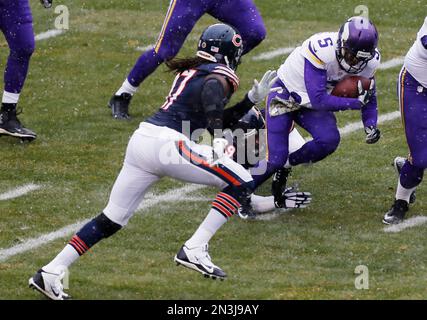 Chicago Bears' Jared Allen, left, talks to outside linebacker Lance Briggs  during NFL football minicamp Thursday, June 19, 2014, in Lake Forest, Ill.  (AP Photo/Charles Rex Arbogast Stock Photo - Alamy