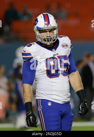 Buffalo Bills tight end Lee Smith (85) charges down field while chased by  New England Patriots defensive back Adrian Phillips (21) on a reception in  the fourth quarter at Gillette Stadium in