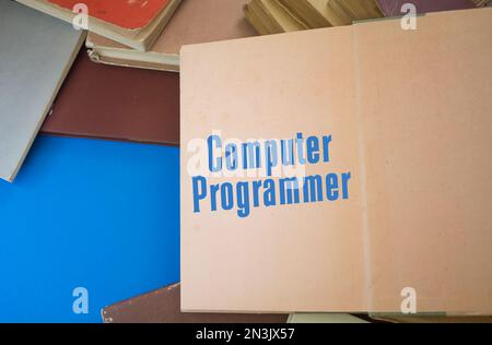 Computer Programmer word in opened book with vintage, natural patterns ...